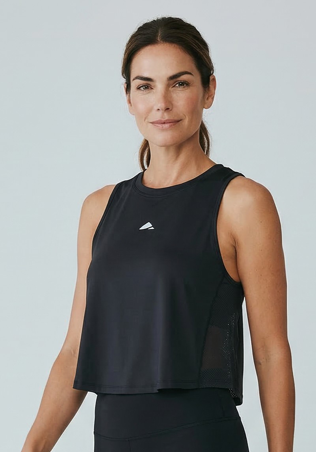 Layer AeroFlow Training Vest in black, front view
