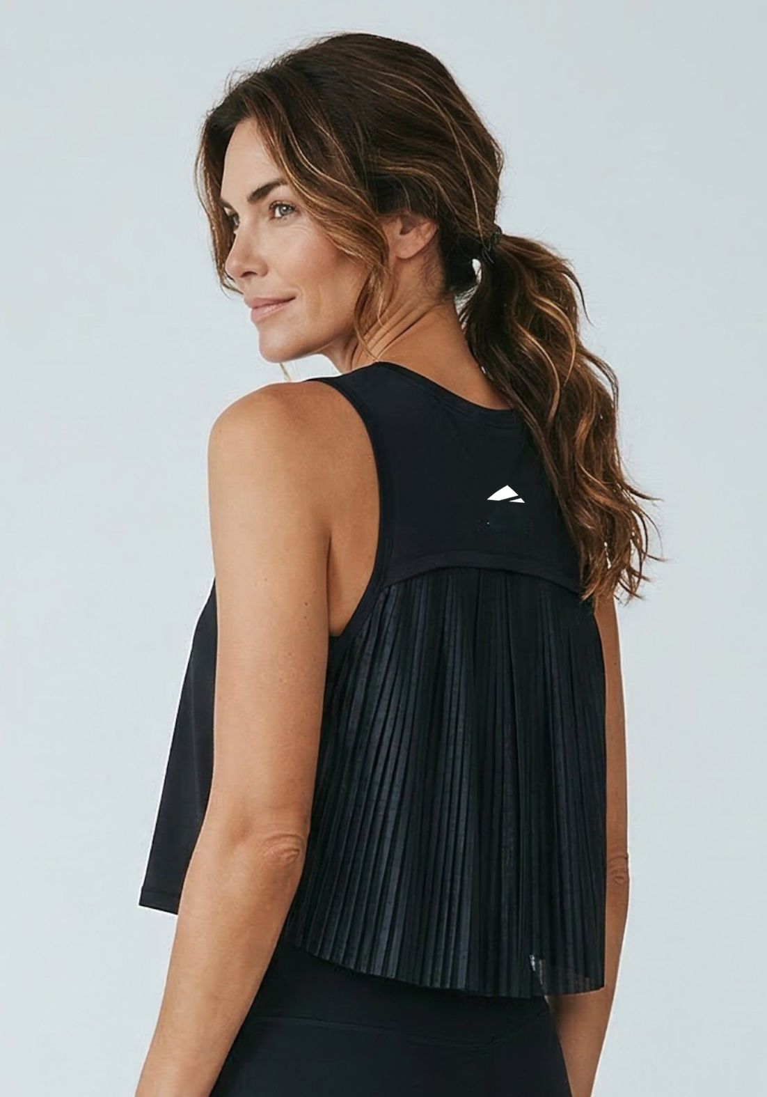 Layer AeroFlow Training Vest in black, back view
