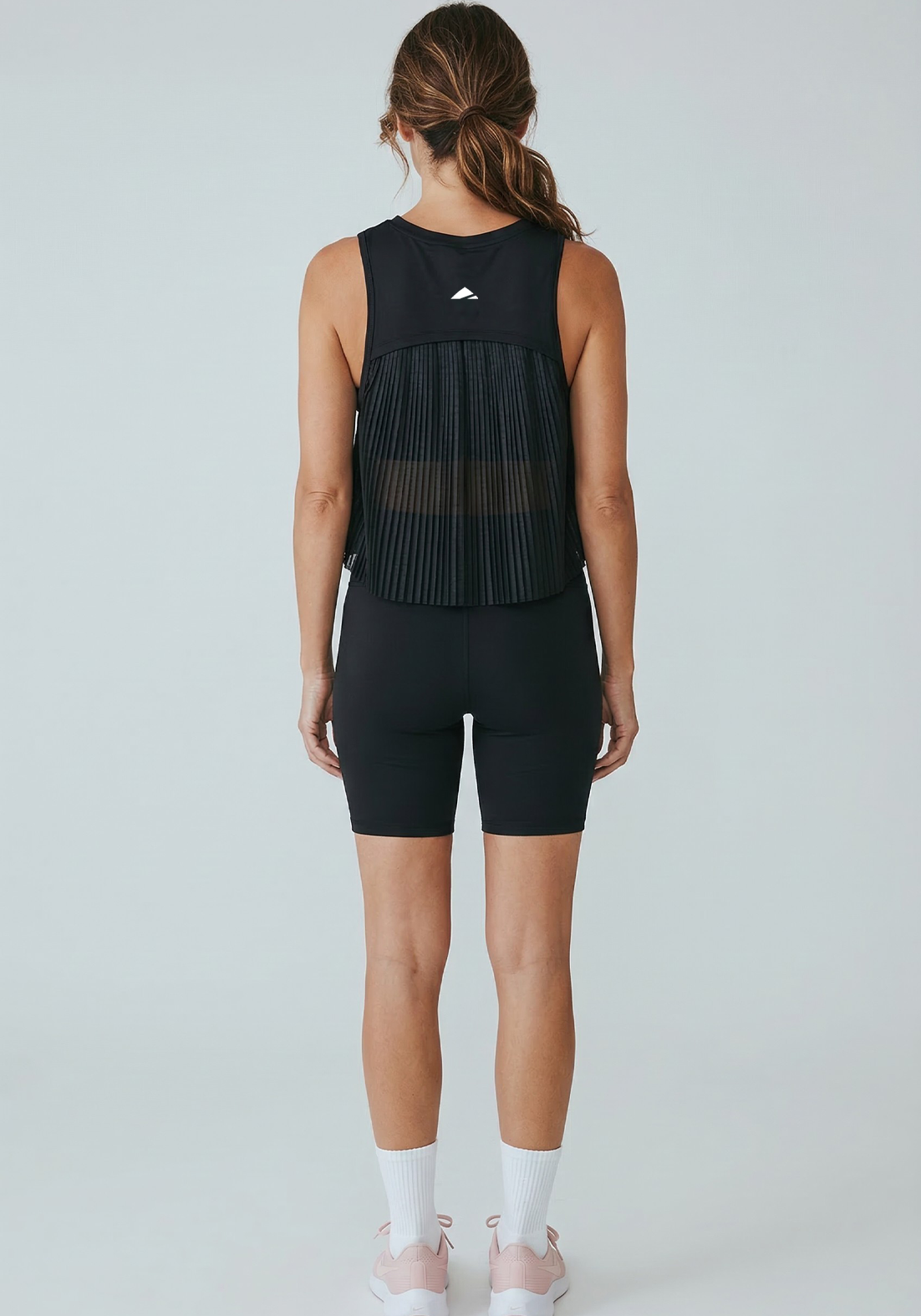 Layer AeroFlow Training Vest in black worn during training
