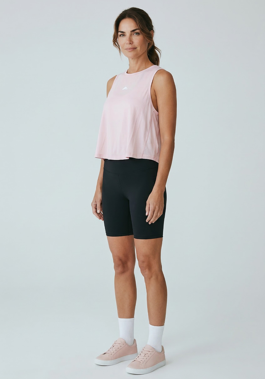 Layer AeroFlow Training Vest in pink, side view
