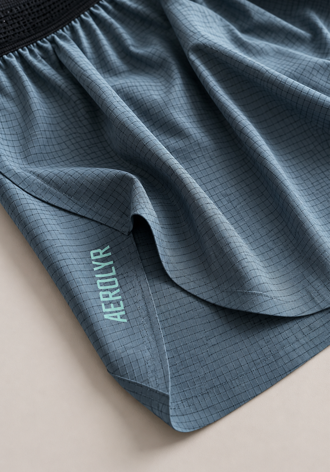 Layer AeroLYR Split Run Shorts in Storm Grey, split hem detail
