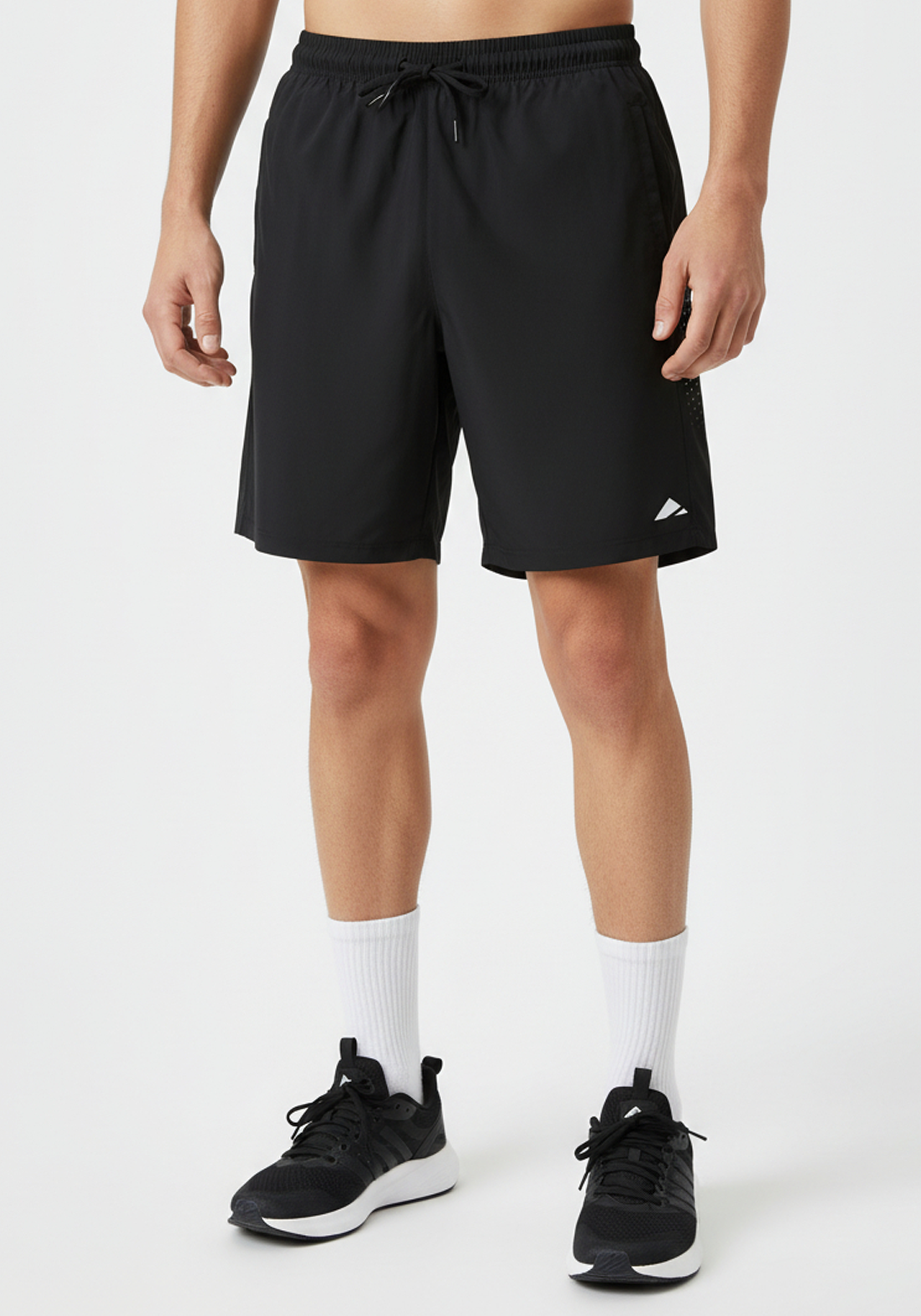Layer Axis Training Shorts in black shown from the front with elastic waistband drawcord and minimalist Layer logo