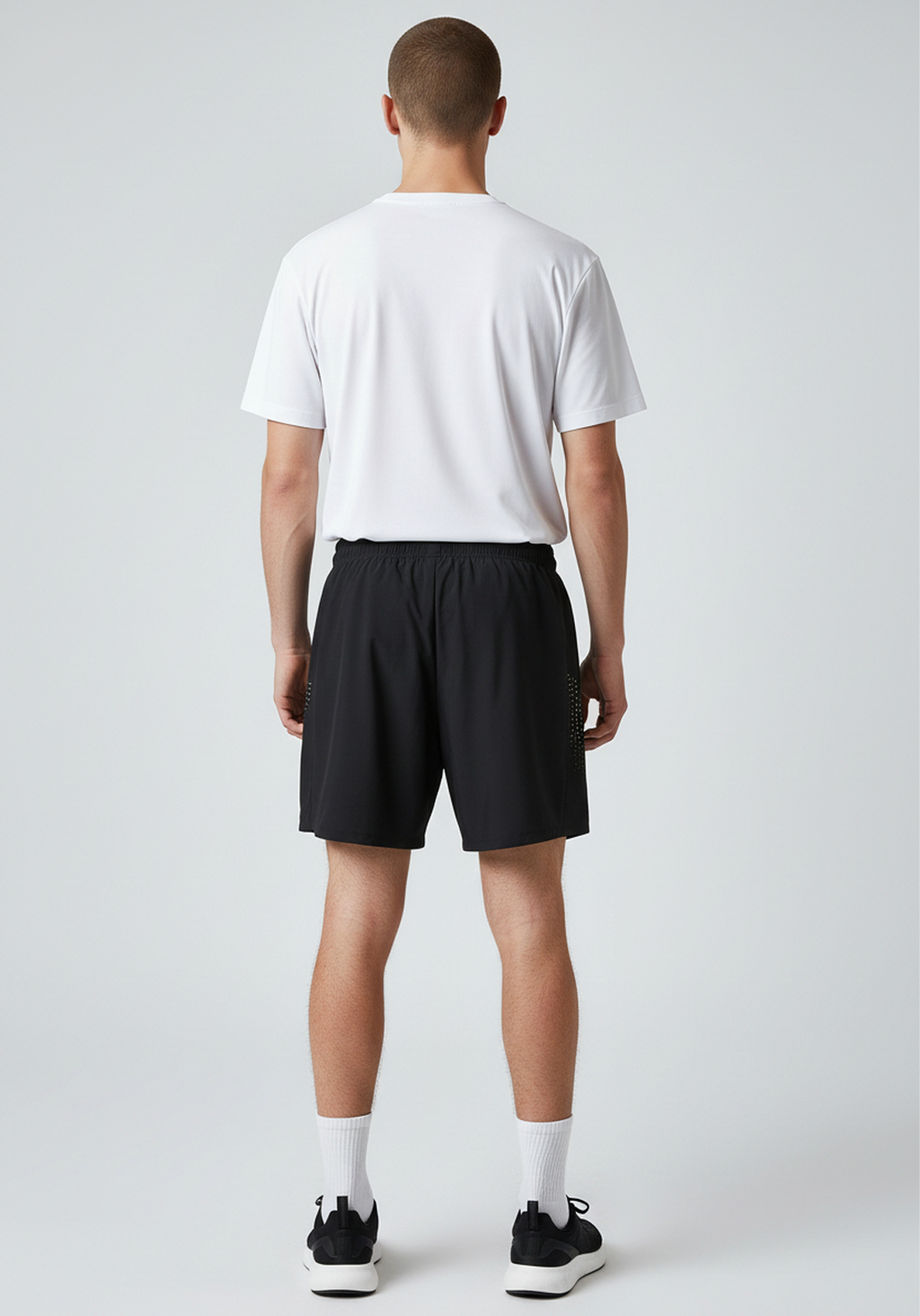Layer Axis 7" Training Shorts in black, back studio view
