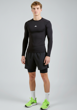 BaseLYR Long Sleeve Compression Top in black, front side view showing close fit
