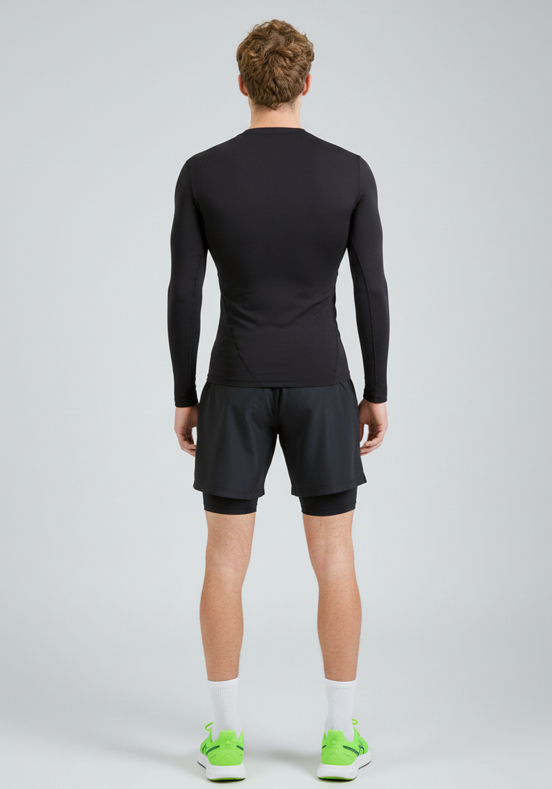 BaseLYR Long Sleeve Compression Top in black, back view full
