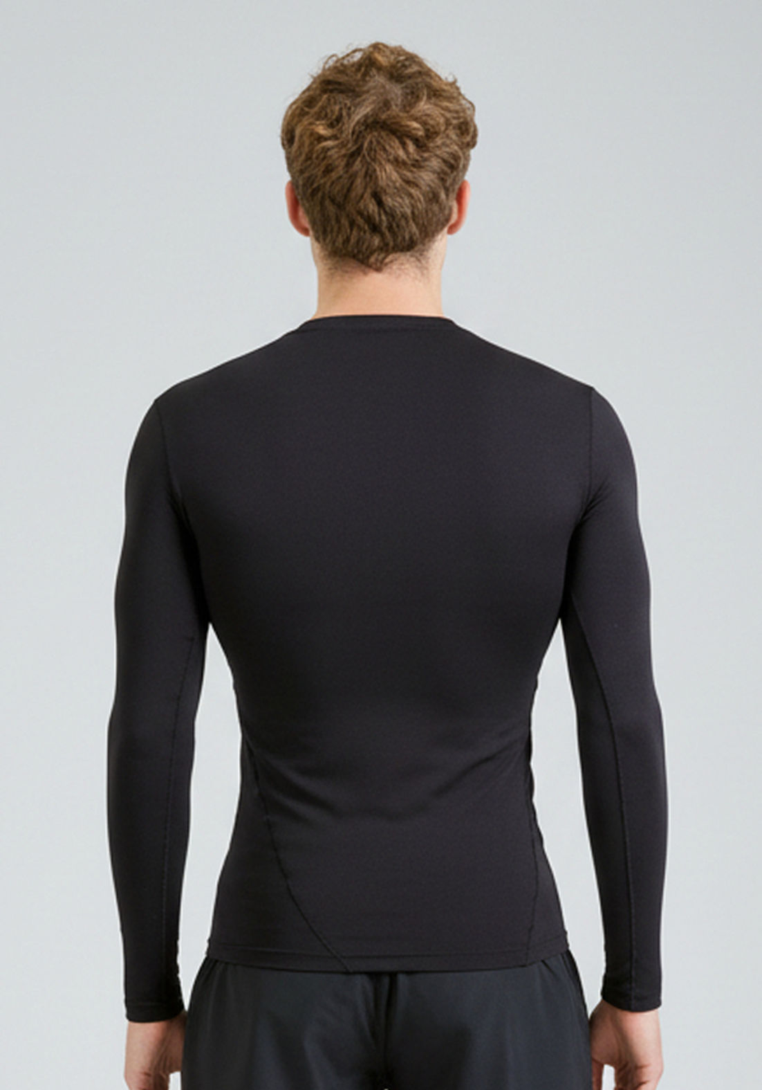 BaseLYR Long Sleeve Compression Top in black, back view