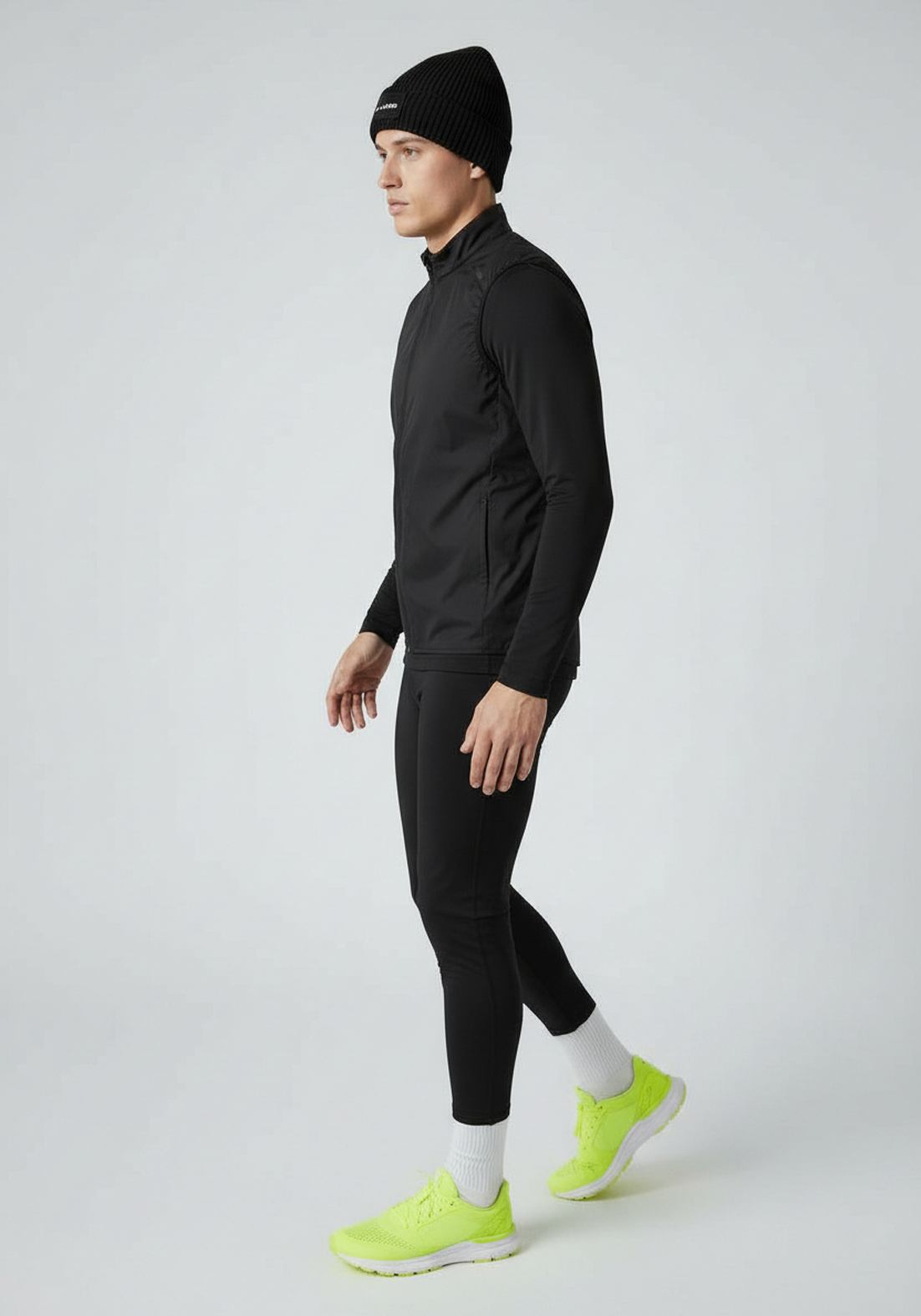 Side profile of Black Layer ColdLYR beanie designed for cold weather running