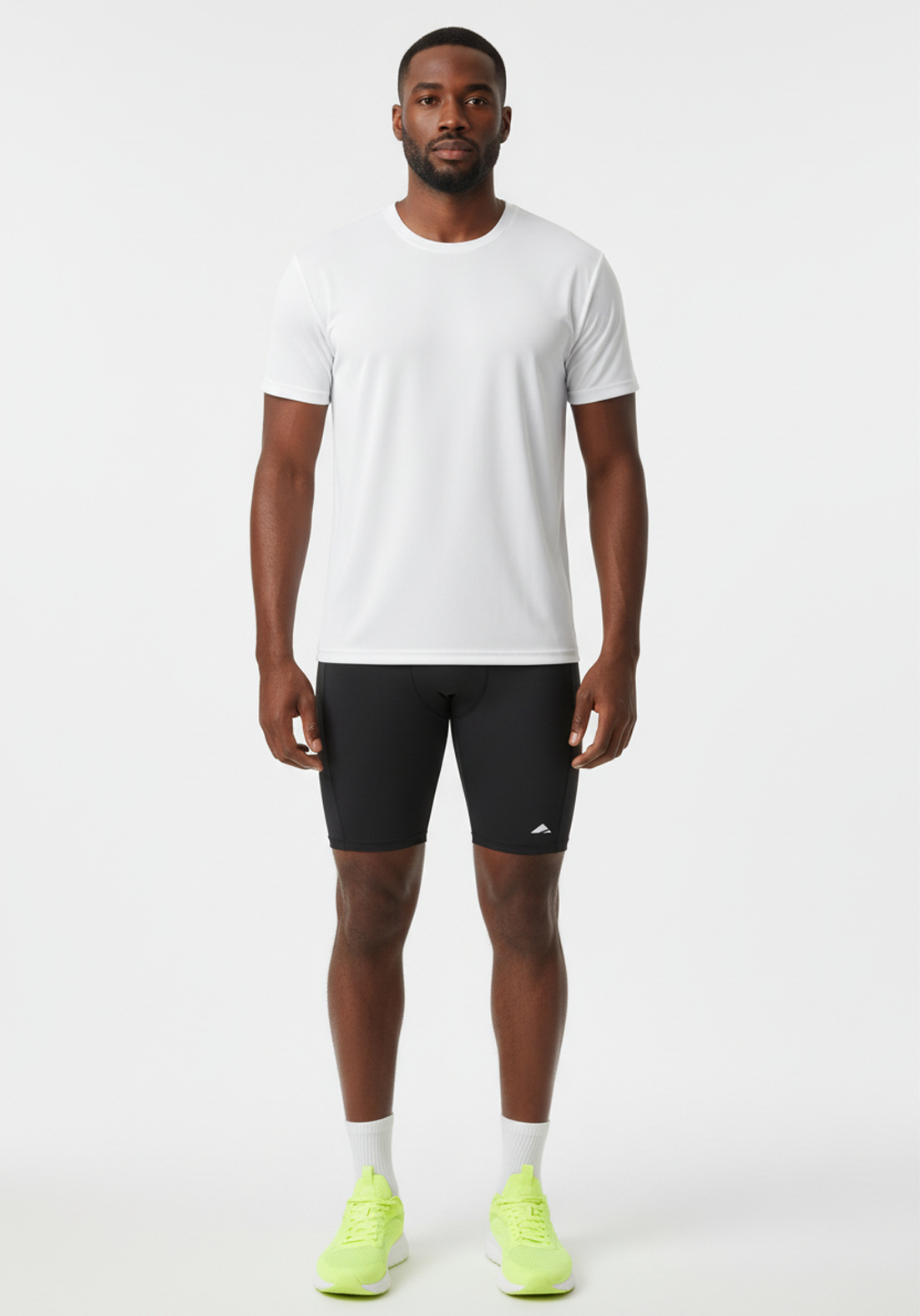 Layer Core men’s black running tights showing stretch fabric and movement