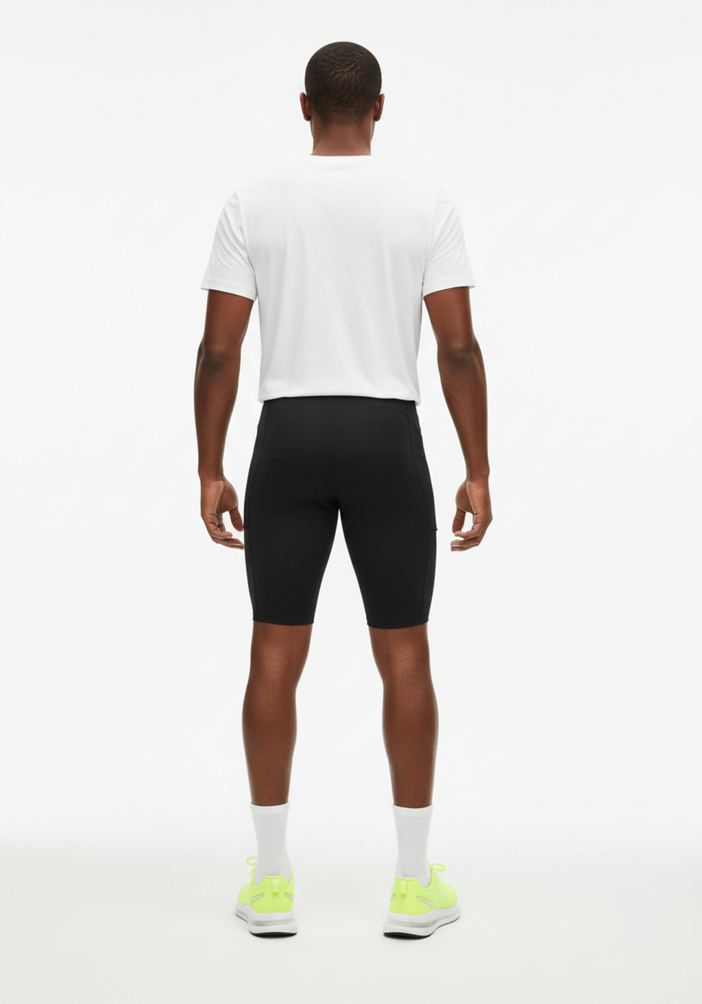 Layer Core men’s running short tights in black with secure rear zip pocket detail