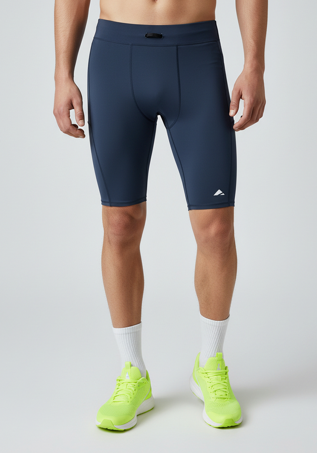Layer Core Run short tights in navy studio product image showing clean panel construction