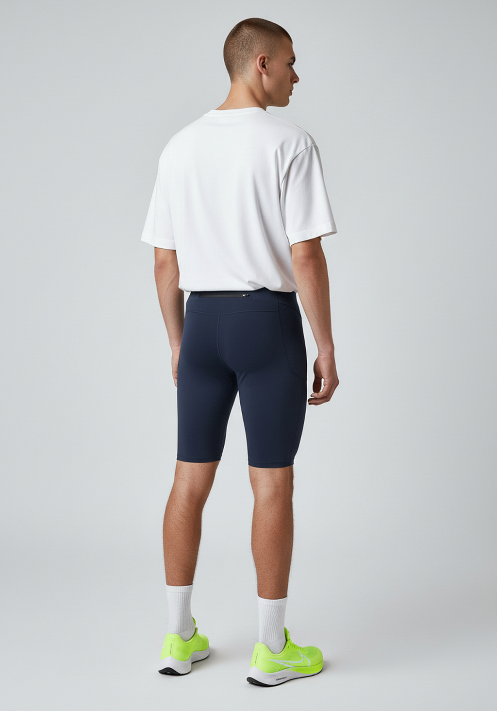 Layer men’s Core Run short tights navy rear view showing secure zipped back pocket