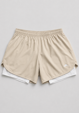 Layer Engage 2-in-1 running shorts in beige, front flatlay