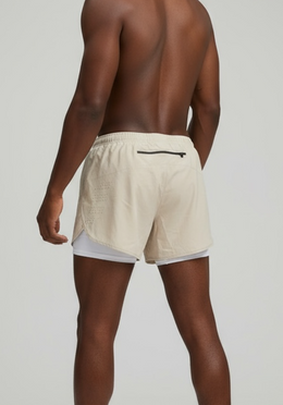 Layer Engage 2-in-1 running shorts in beige, on-model view