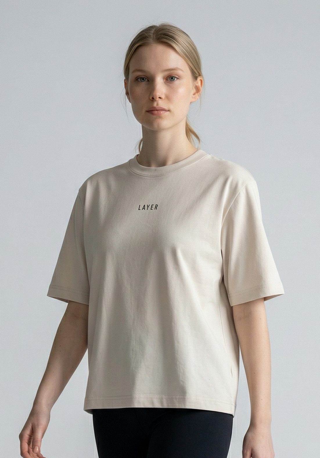 Layer FLXFIT Box Tee in Cloud, walking close up view
