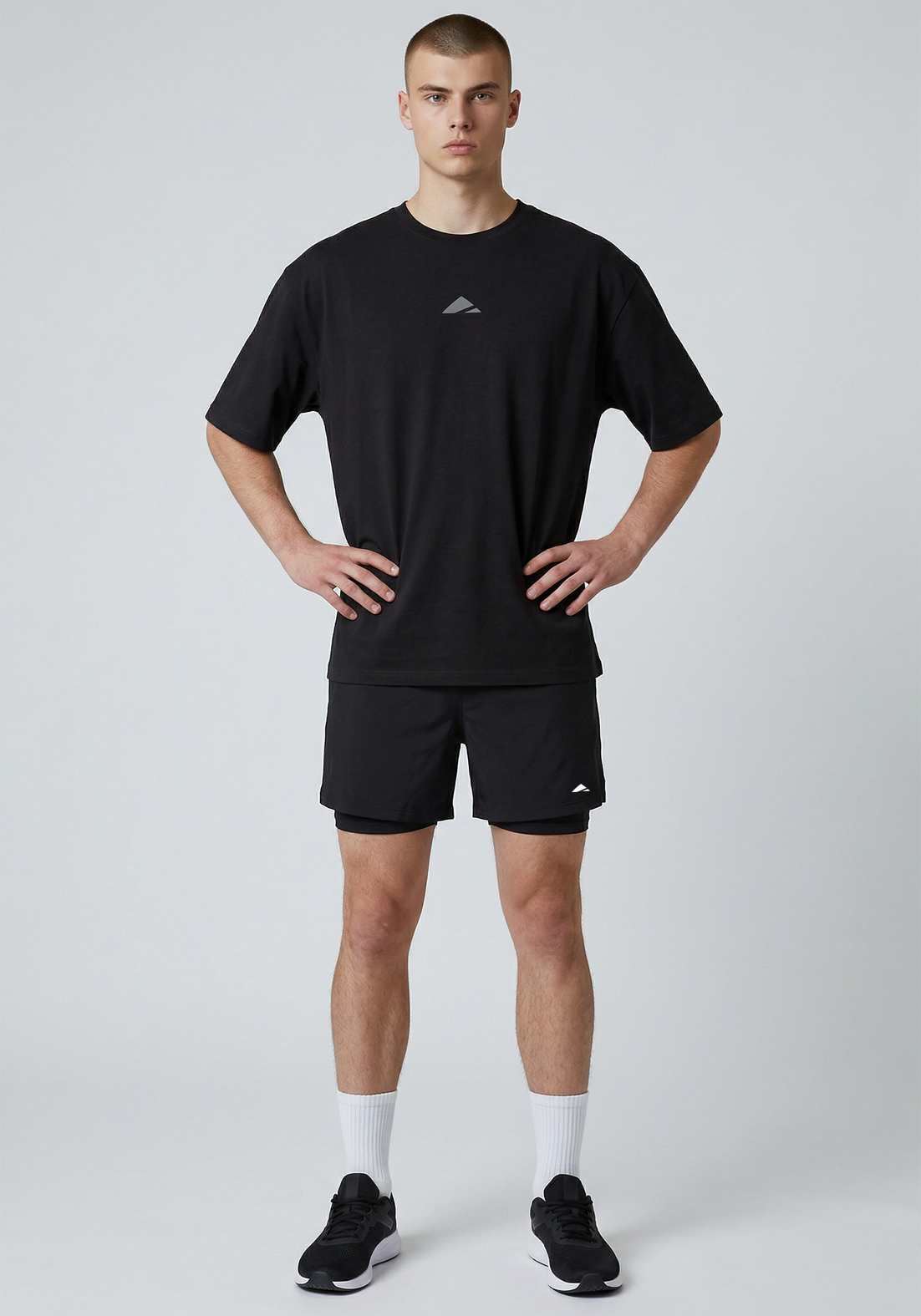 Layer FLXFIT Oversized Training Tee in Black, full front view
