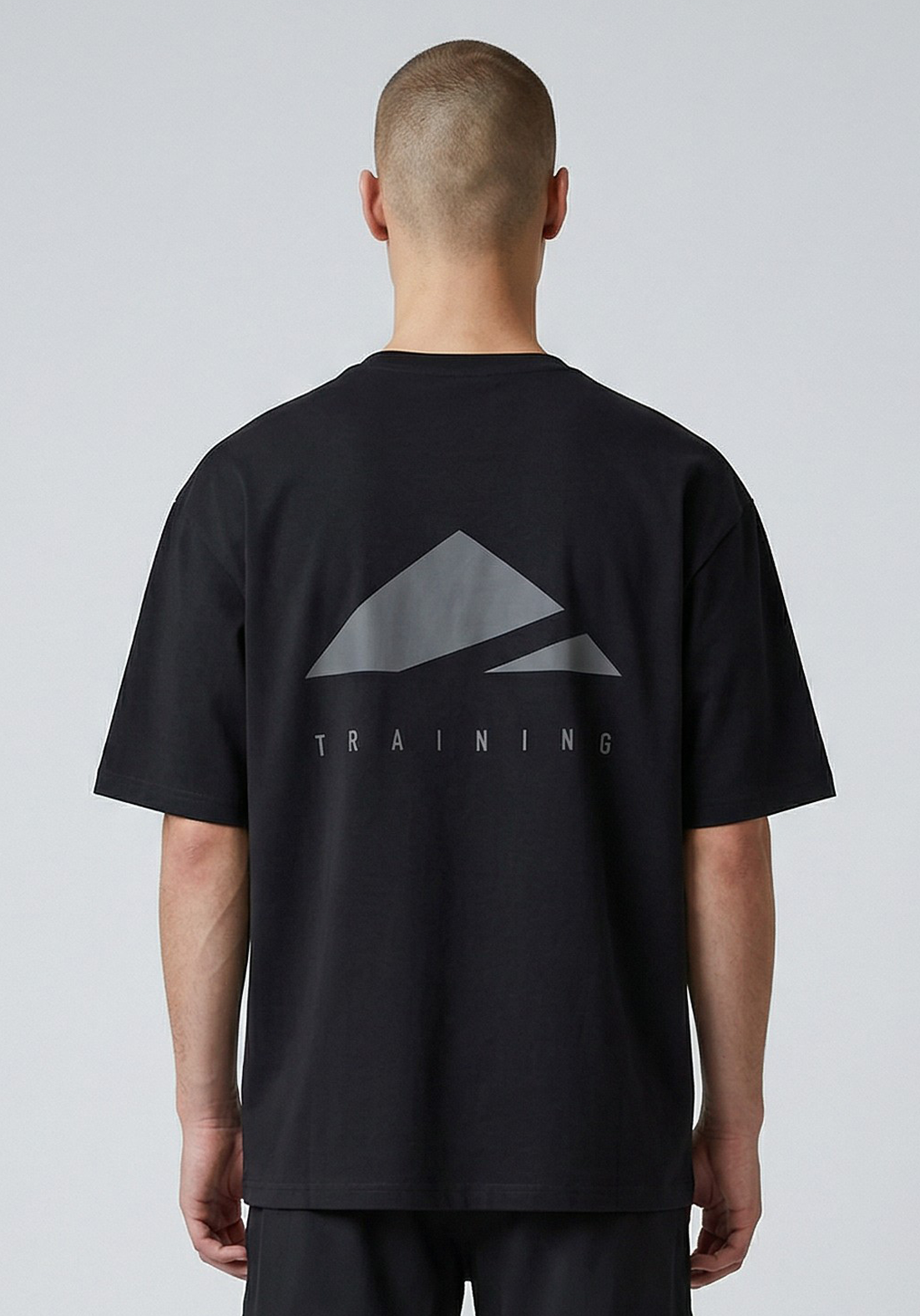 Layer FLXFIT Oversized Training Tee in Black, back view
