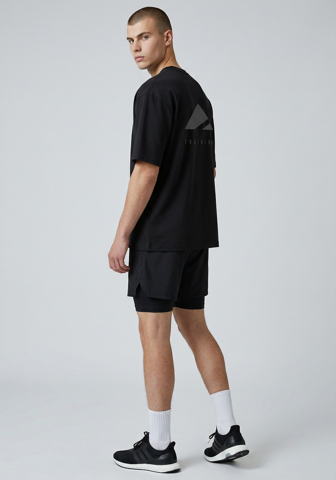 Layer FLXFIT Oversized Training Tee in Black, side view
