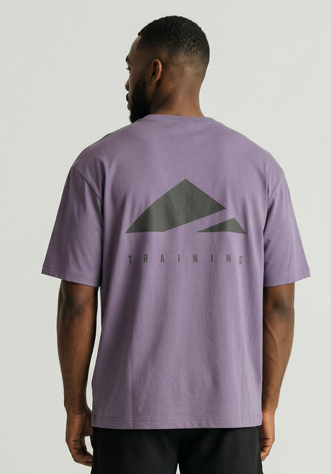 Layer FLXFIT Oversized Training Tee in Dusty Purple, back view
