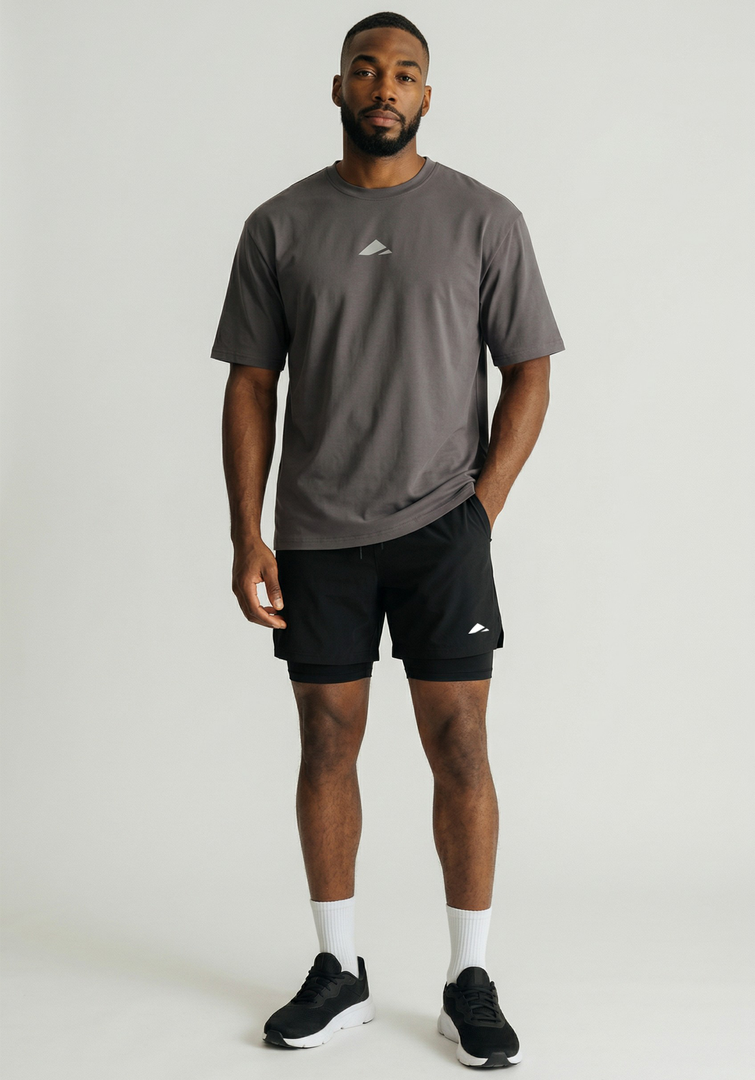 Layer FLXFIT Oversized Training Tee in Graphite, full front view
