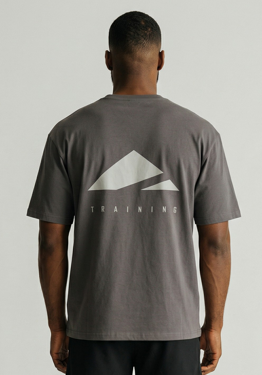 Layer FLXFIT Oversized Training Tee in Graphite, back view
