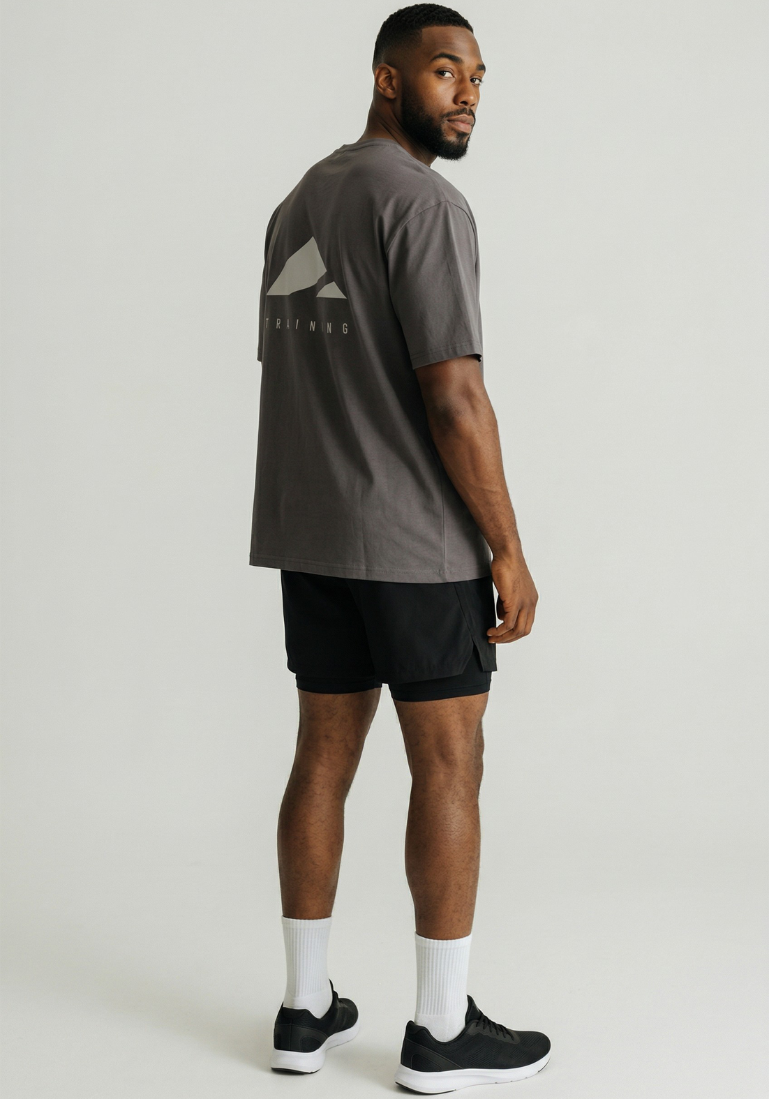 Layer FLXFIT Oversized Training Tee in Graphite, side view
