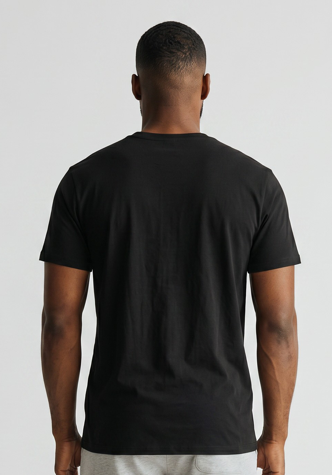 Layer FLXFIT Icon Training Tee in Black, back view
