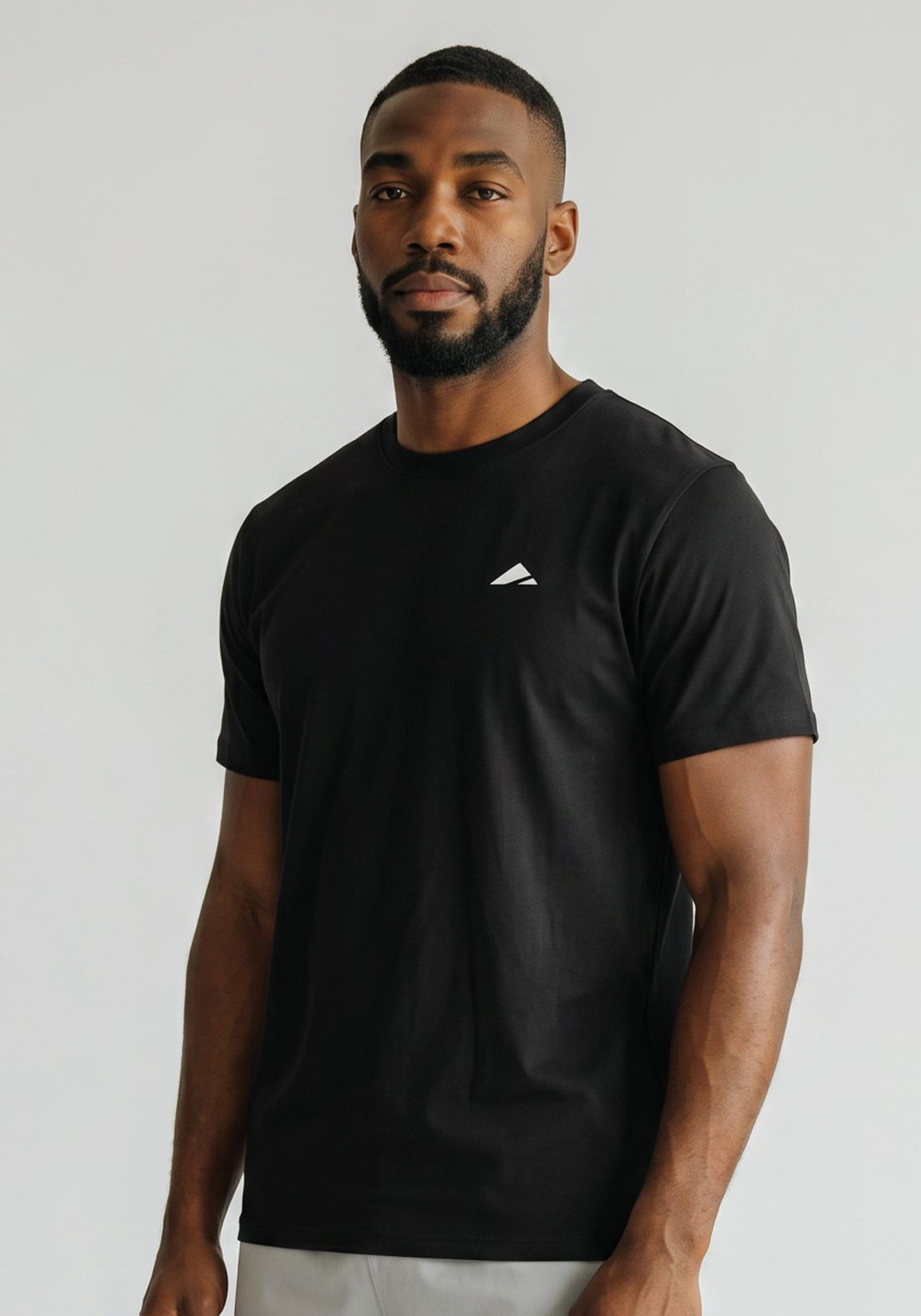 Layer FLXFIT Icon Training Tee in Black, angled view
