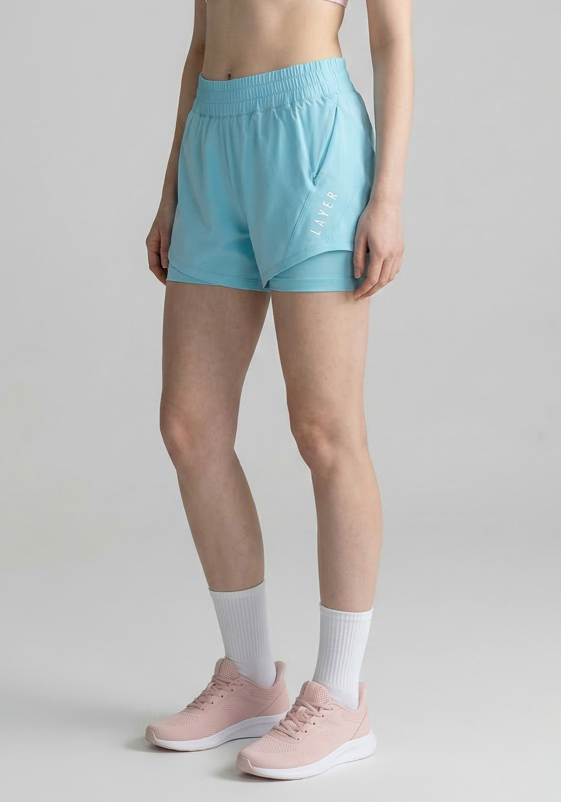 Layer FTR 2-in-1 Running Shorts in Light Blue, side view
