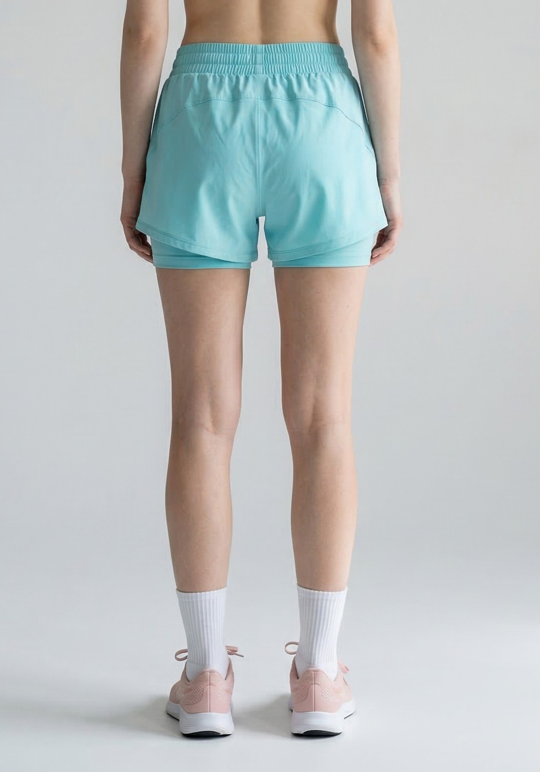 Layer FTR 2-in-1 Running Shorts in Light Blue, back view
