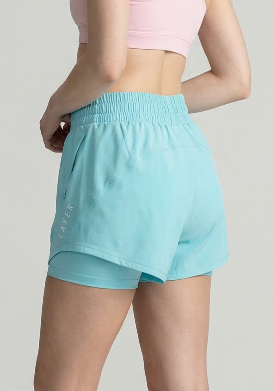Layer FTR 2-in-1 Running Shorts in Light Blue, back side view
