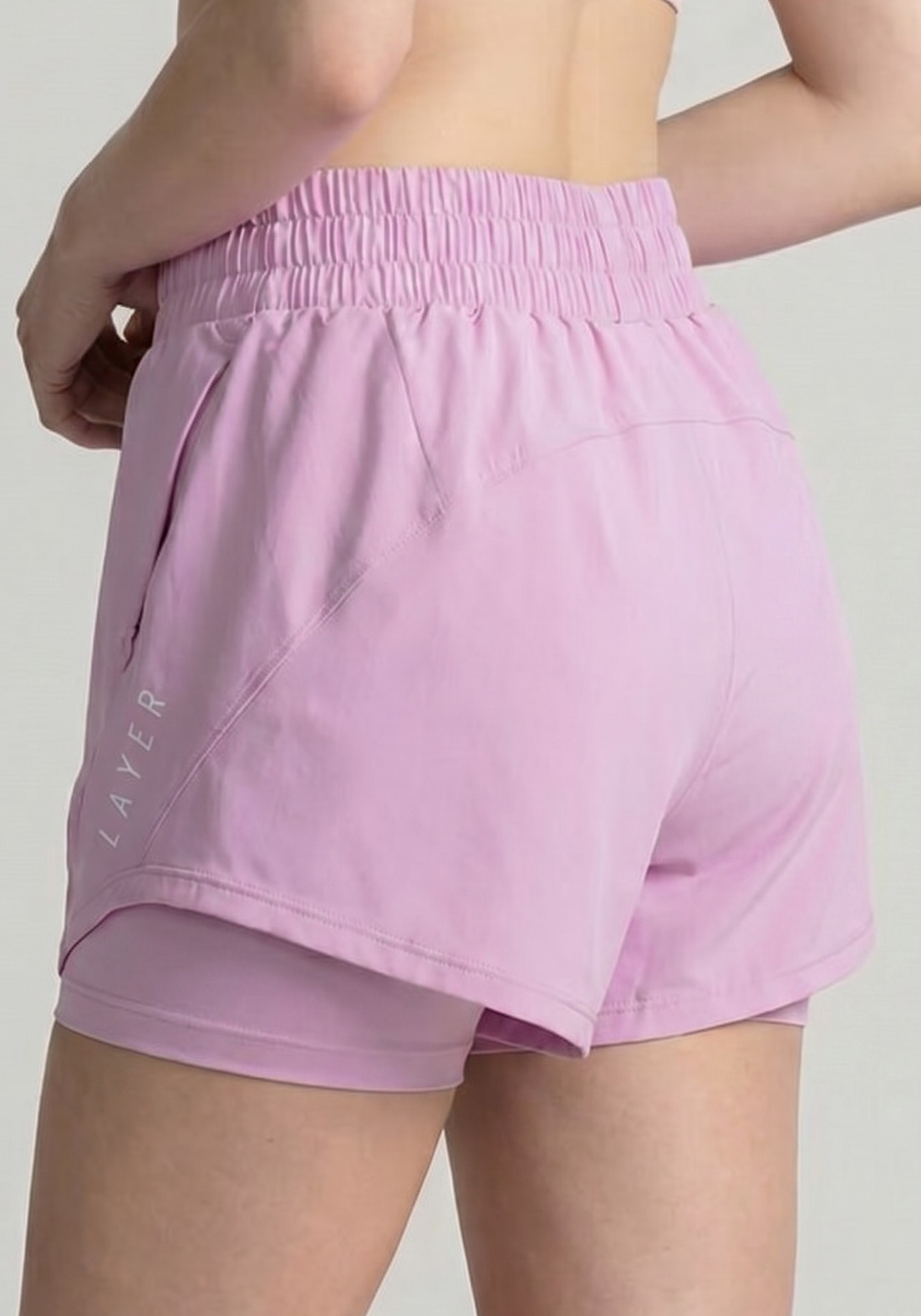 Layer FTR 2-in-1 Running Shorts in Soft Pink, side view
