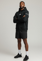 Layer FTR Shadow Hoodie in black worn by male runner front view