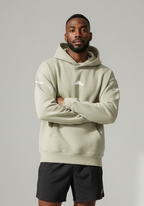 Layer FTR Shadow Hoodie sand close up showing chest logo and hood