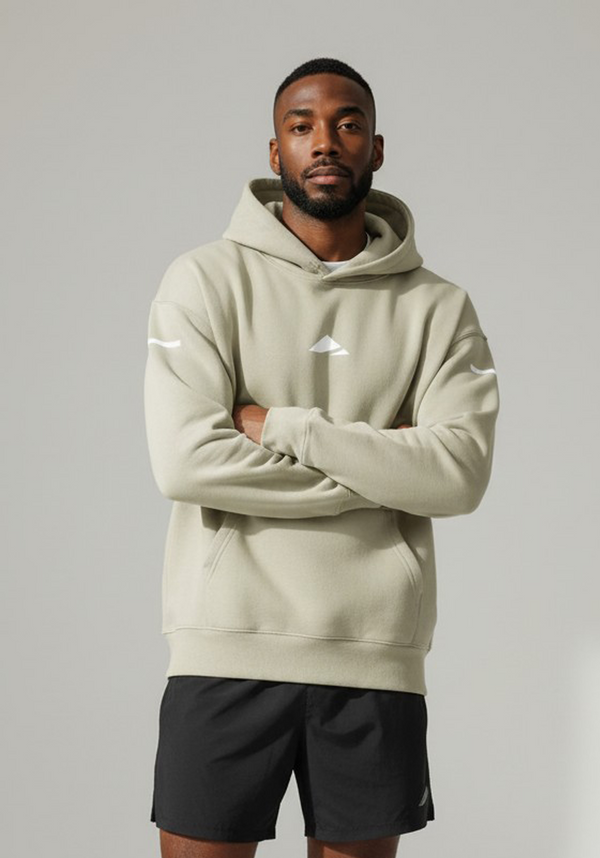 Layer FTR Shadow Hoodie sand close up showing chest logo and hood