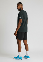 Layer FTR Shadow Tee in black shown from rear three quarter view with short sleeves and relaxed athletic fit For The Run