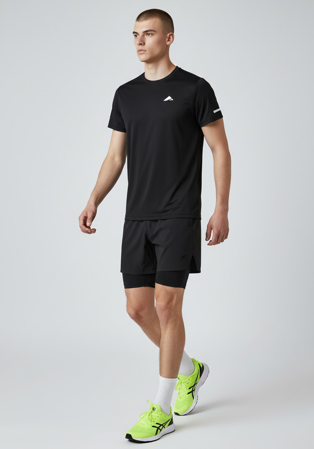 Layer black short sleeve running top shown from the front, soft lightweight fabric with a true-to-size fit.