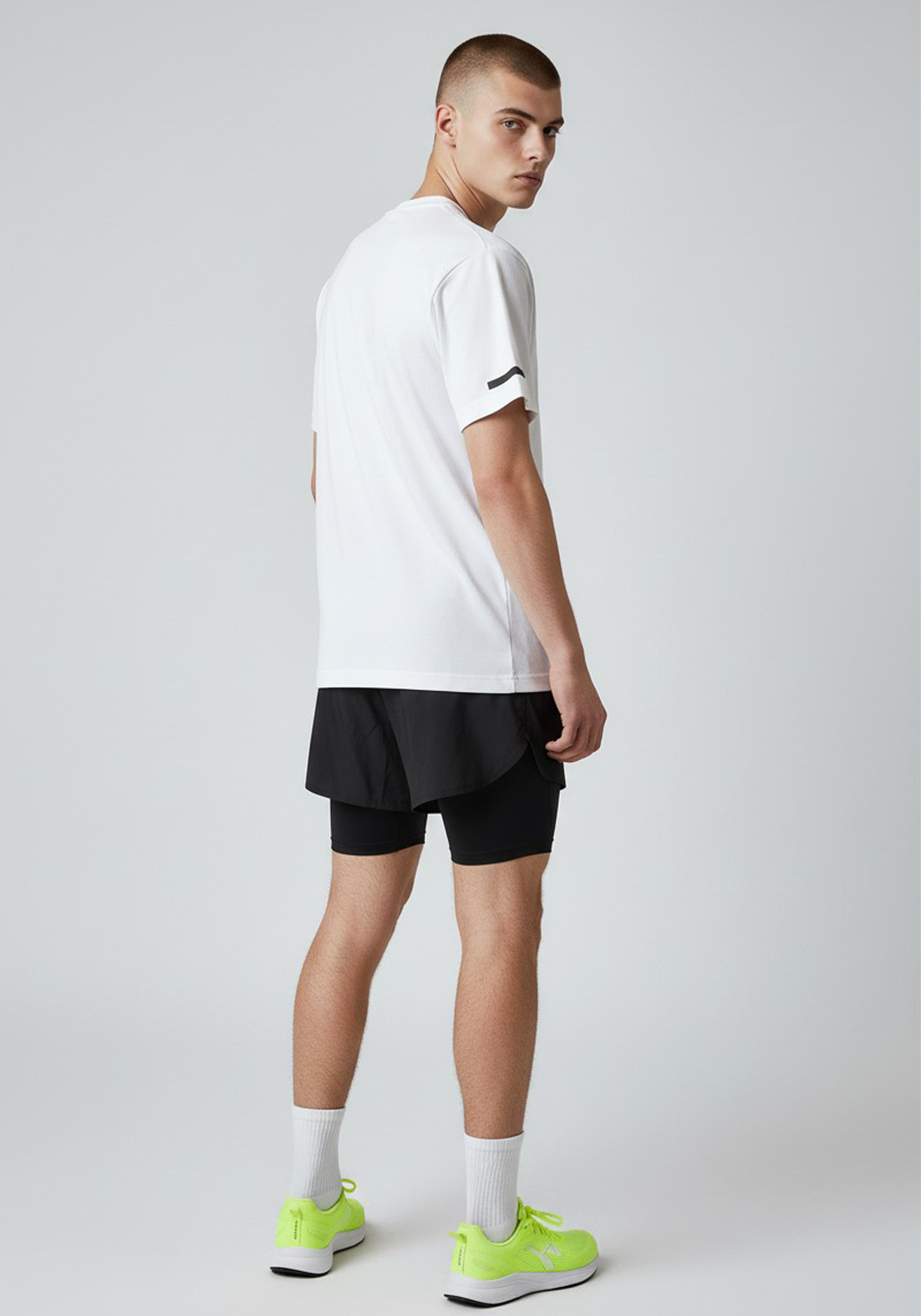 Side view of Layer For The Run white short sleeve running tee, designed for running and gym training.
