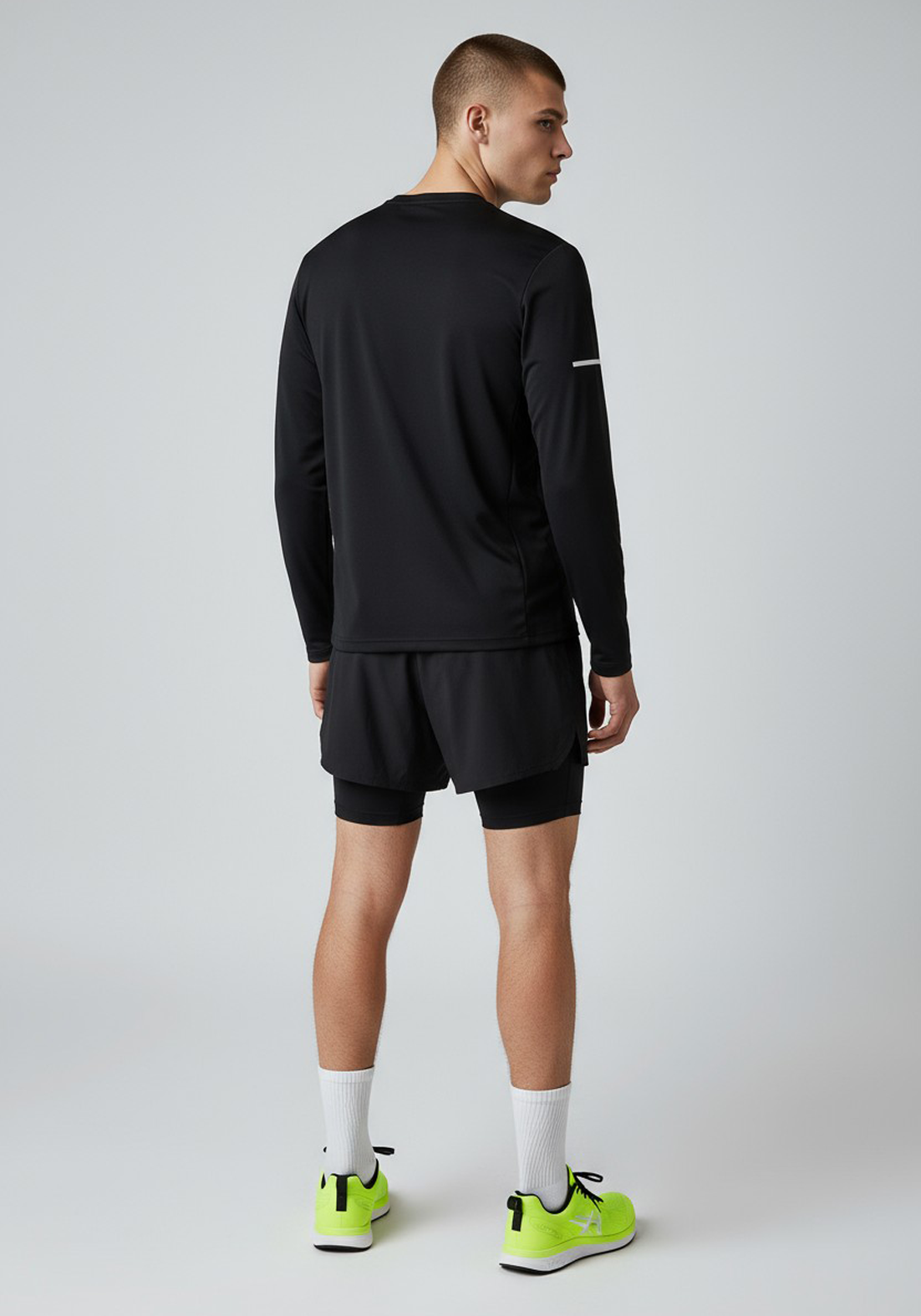 Layer Men’s For The Run Long Sleeve Tee in black – on-model back view showing sleek minimalist design