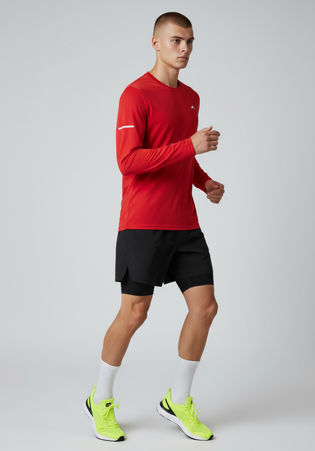 Layer Men’s For The Run Long Sleeve Tee in red – on-model side view highlighting stretch fabric and ventilation