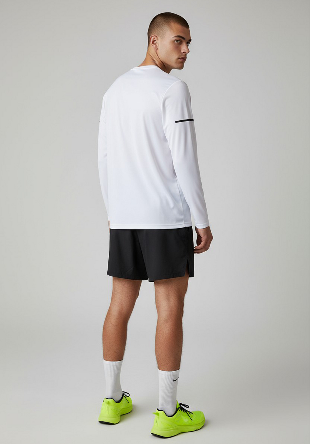 Layer Men’s For The Run Long Sleeve Tee in white – on-model back view highlighting lightweight technical fabric
