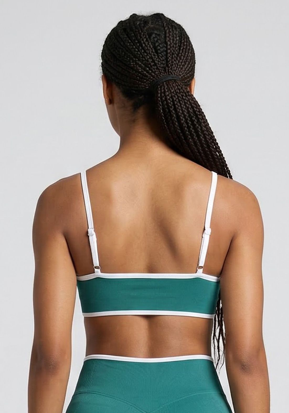 Layer Fusion Training Bra in Coastal Teal, back view
