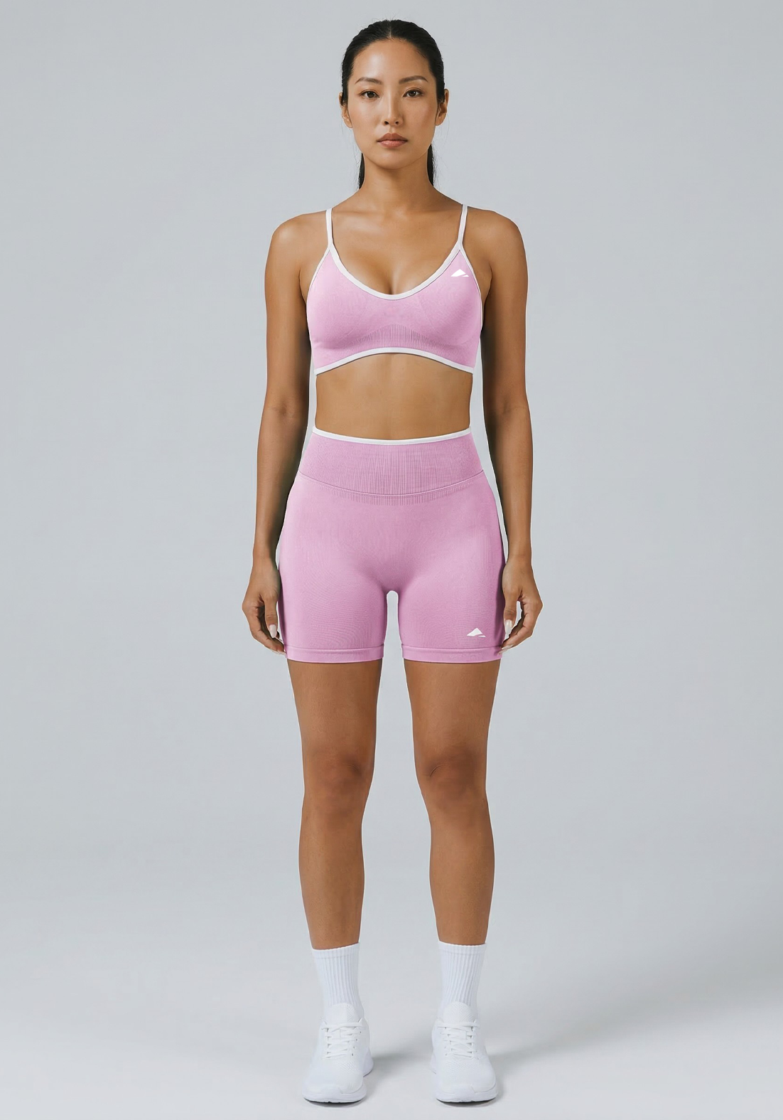 Layer Fusion Training Bra in Dawn Pink, front full view
