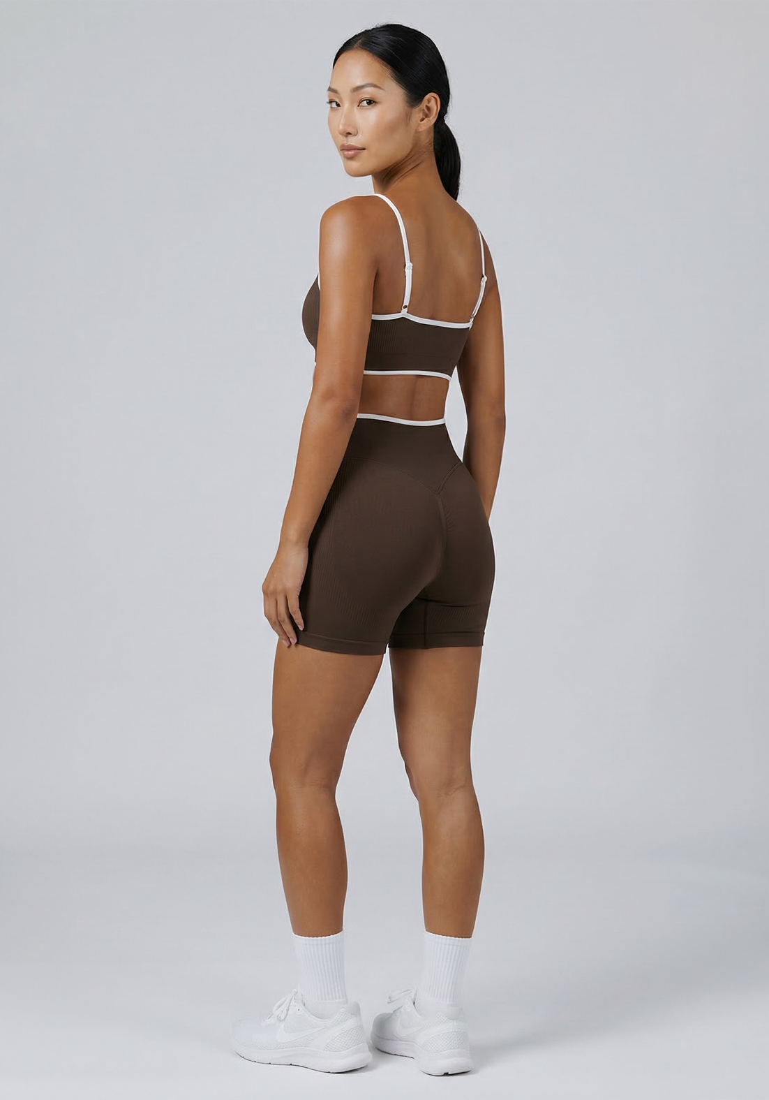 Layer Fusion 4 Training Shorts in Coffee, back angled view
