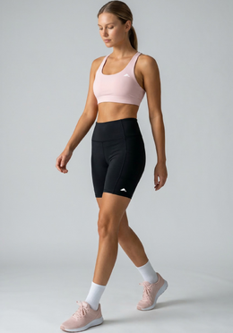 Layer Hybrid Training Tight Shorts in Black, walking view
