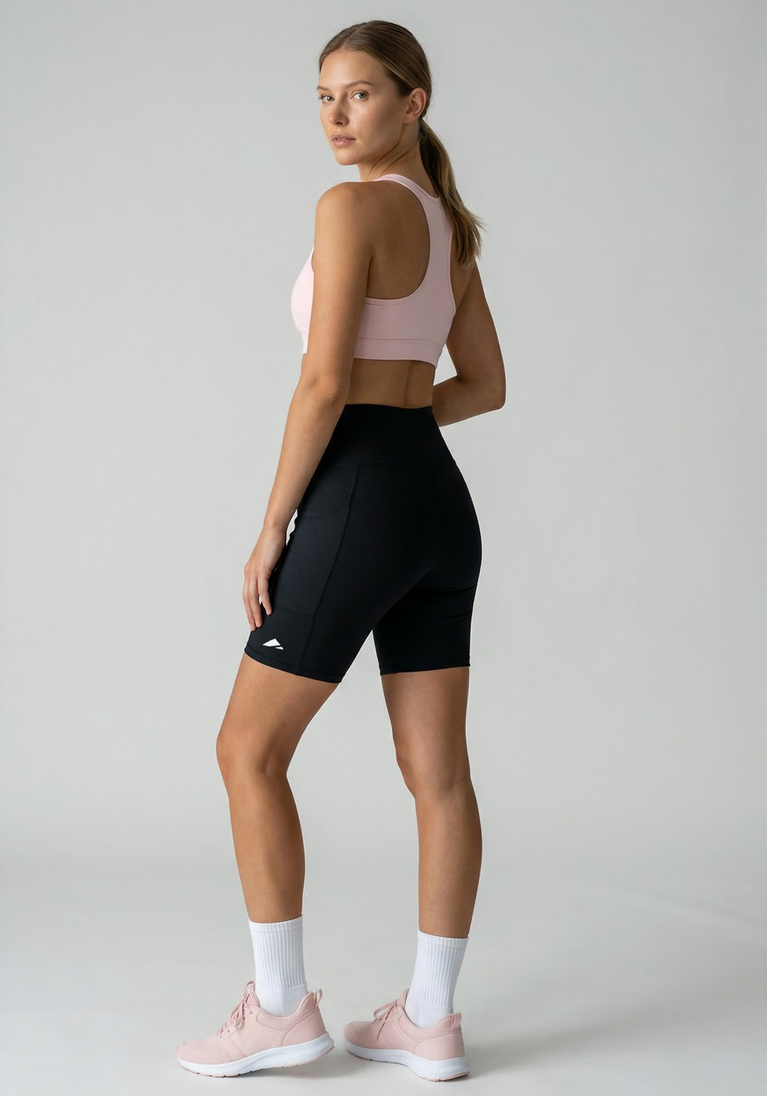 Layer Hybrid Training Tight Shorts in Black, back side view
