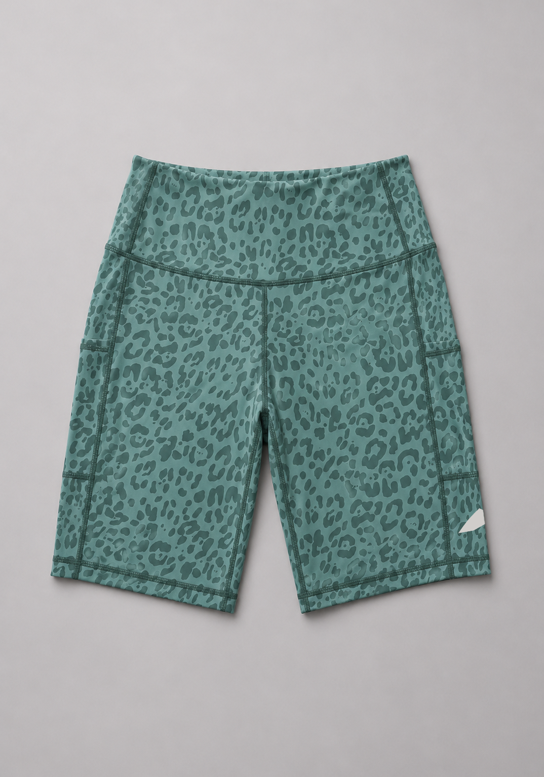 Layer Hybrid Training Tight Shorts in Green Leopard Print, flat lay
