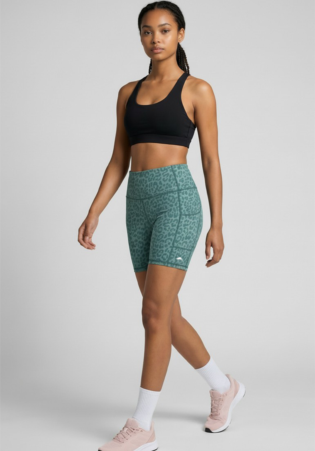 Layer Hybrid Training Tight Shorts in Green Leopard Print, walking view
