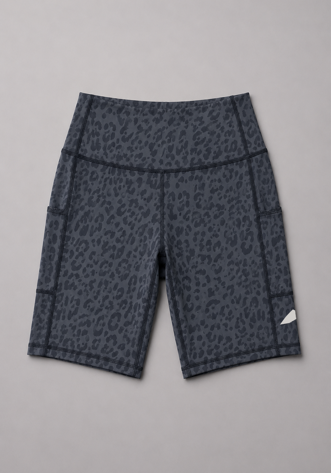 Layer Hybrid Training Tight Shorts in Dark Grey Leopard Print, flat lay
