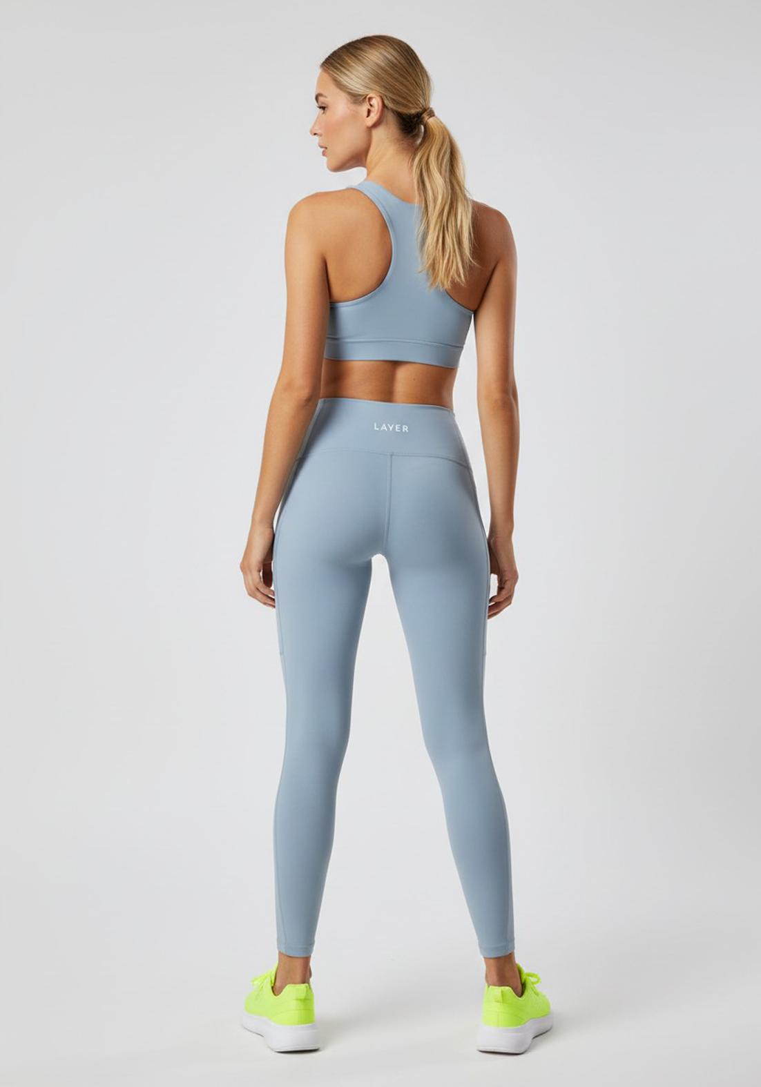Layer LRX Training Leggings in Glacier Blue, full back view
