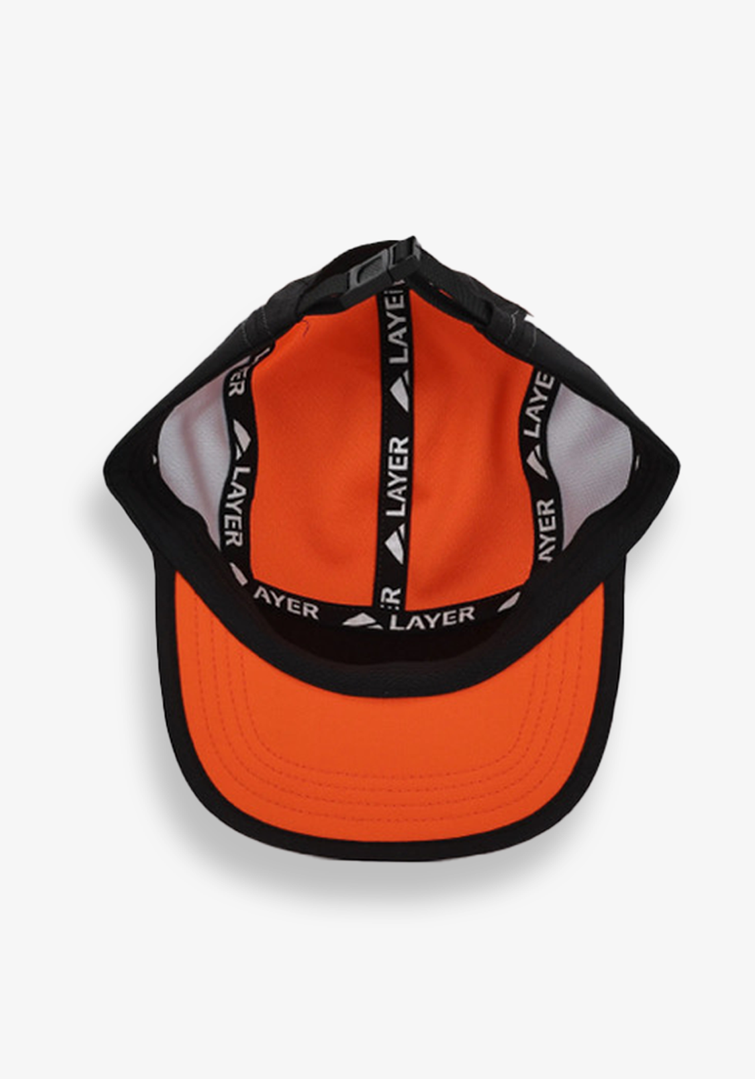 Inside view of Layer running cap black and orange showing breathable mesh panels and branded internal taping